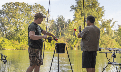 What is a spod - two men holding spod rods