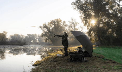 Best Season for Carp Fishing - Man casting carp rod