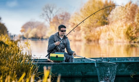 Do carp put up a good fight - carp caught by angler in net